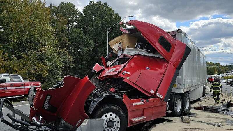 No one was injured in the tractor trailer crash near Georgia, North Carolina (Image: Huntersville FD / SWNS)