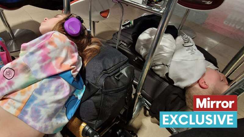 The kids were left to sleep on bags at the airport overnight (Image: Jade Roberts)