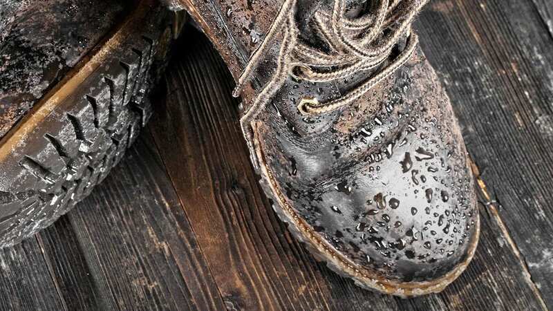 Shoppers are reaching for a £9.99 spray to protect their shoes from wet weather damage (Image: Kiwi)