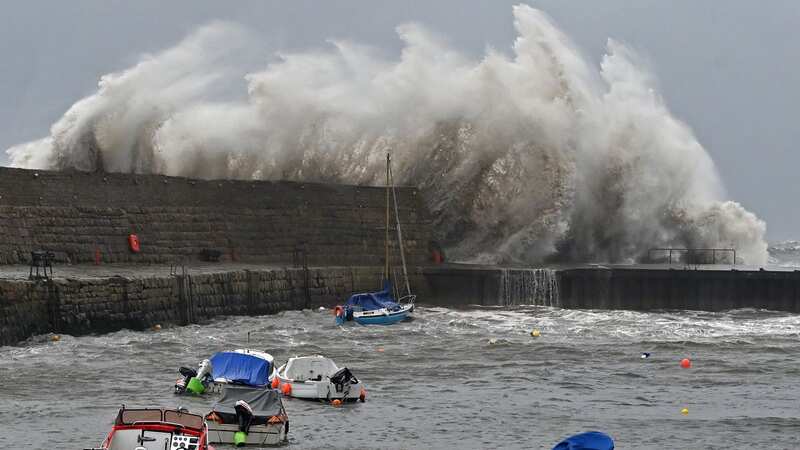 Waves break over Dysart harbour wall in Kirkcaldy, Scotland during Storm Babet (Image: Getty Images)