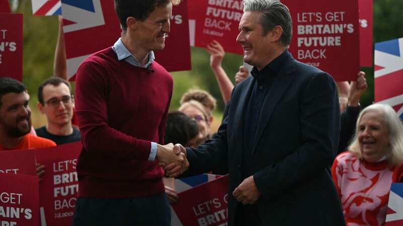 Keir Starmer celebrating the victory in Mid Bedfordshire with new MP Alastair Strathern (Image: AFP via Getty Images)