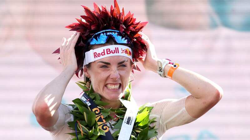 Lucy Charles-Barclay celebrates after winning the Ironman world championship