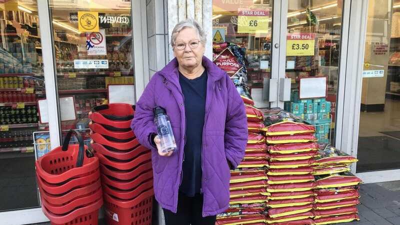 Joyce Deacon with her water bottle outside Poundstretcher in Melksham (Image: Newsquest / SWNS)