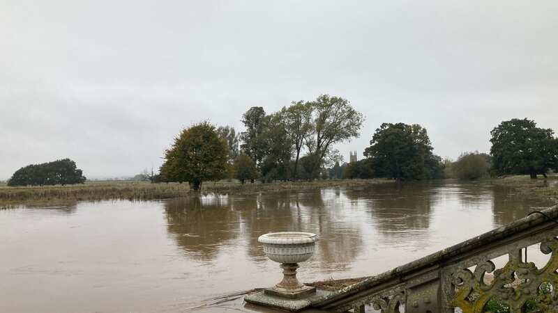 The flood waters at Charlecote Park in Warwickshire (Image: PA)