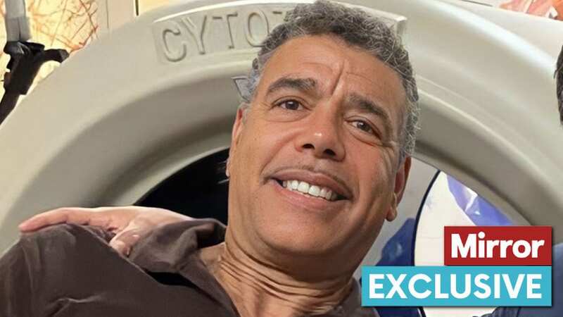 Chris Kamara with the doctor who eased his apraxia (Image: DAILY MIRROR)