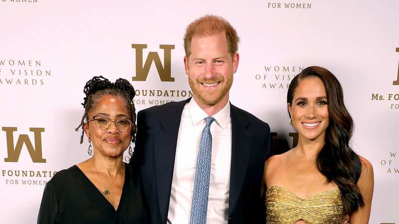 Prince Harry with Meghan and Dora Rgaland (Image: Getty Images Ms. Foundation for)