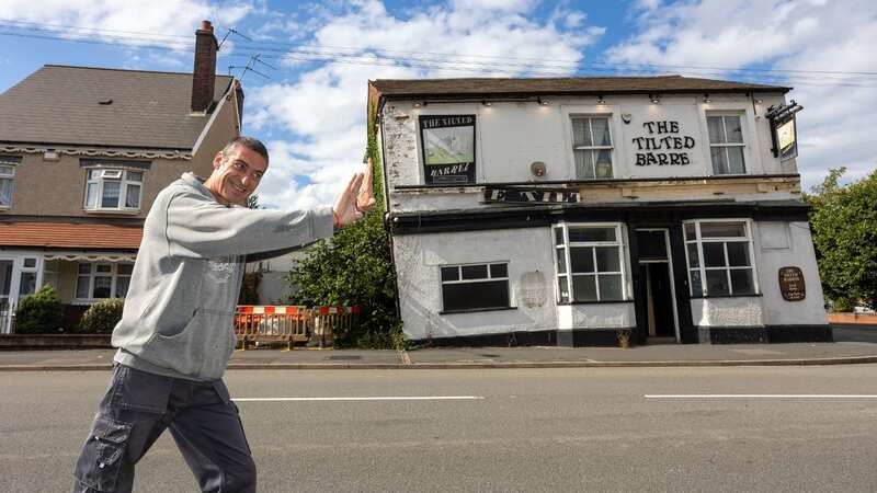 Pub regular Carl Falconer in front of The Tilted Barrel (Image: Anita Maric / SWNS)