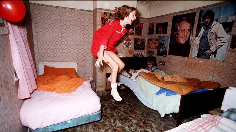 The photo of Janet ‘levitating’ in the bedroom (Image: Graham Morris)