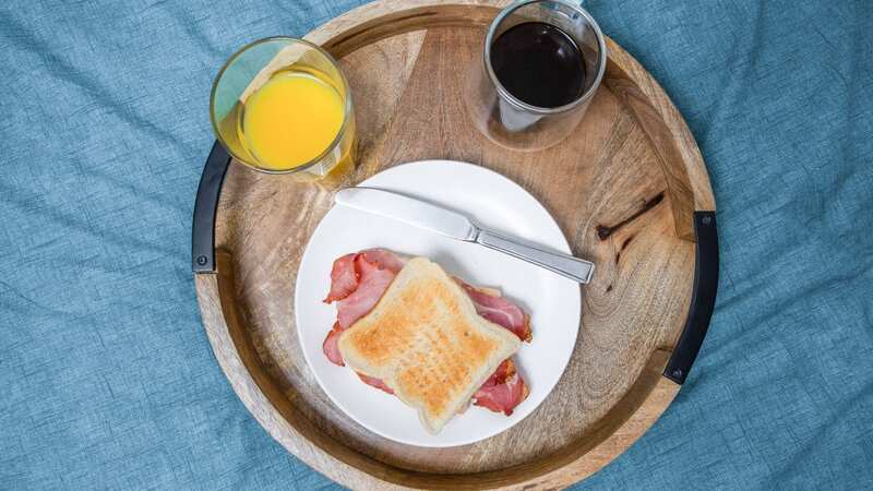 Brits say the perfect breakfast in bed combo is served on a tray, on a Sunday at 8:30am (Image: © SWNS)