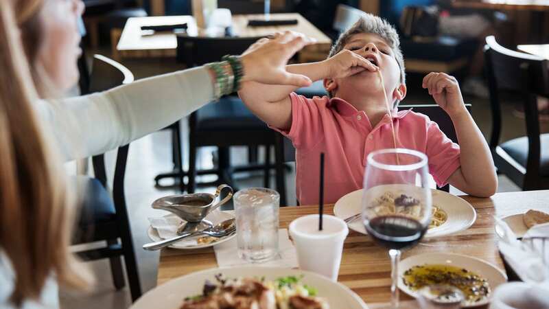 A restaurant in Georgia adds up to $50 (£41) extra to the bill if children are badly behaved (stock images) (Image: Getty Images/Cavan Images RF)