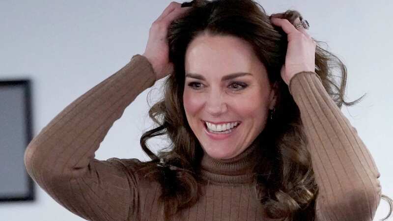 Kate looked super stylish in a matching camel ensemble (Image: PA)