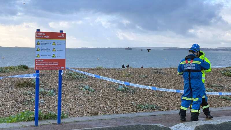 Police officers were called after a body was found on the shore (Image: PA)