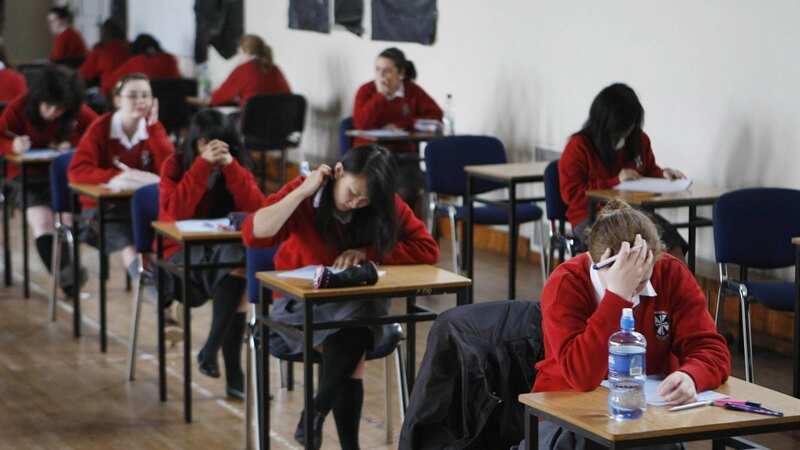Social workers and GPs are needed to help tackle absenteeism, according to the Children