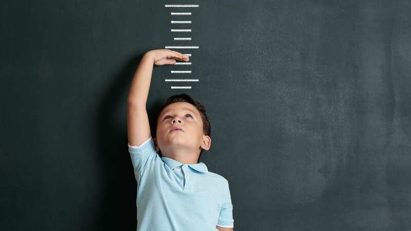 Study showed height increased when children had hope and left hardship behind (Image: Getty Images)