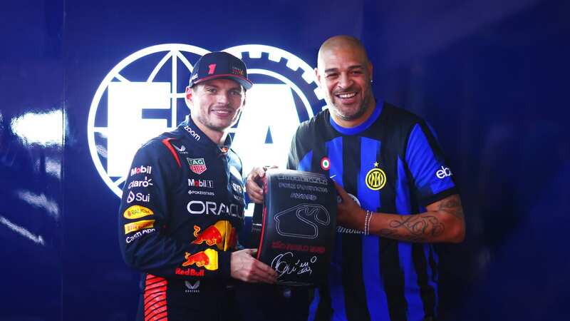 Adriano presents Max Verstappen with his pole position award (Image: Getty Images)