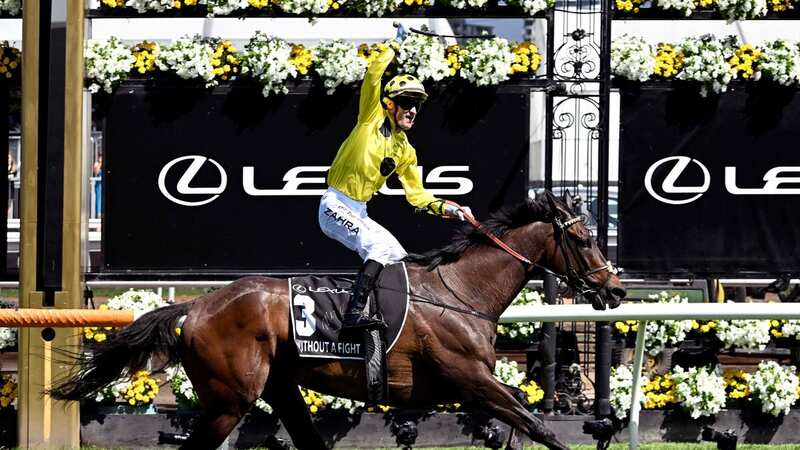 Mark Zahra celebrates winning the Melbourne Cup on Without A Fight (Image: AFP via Getty Images)