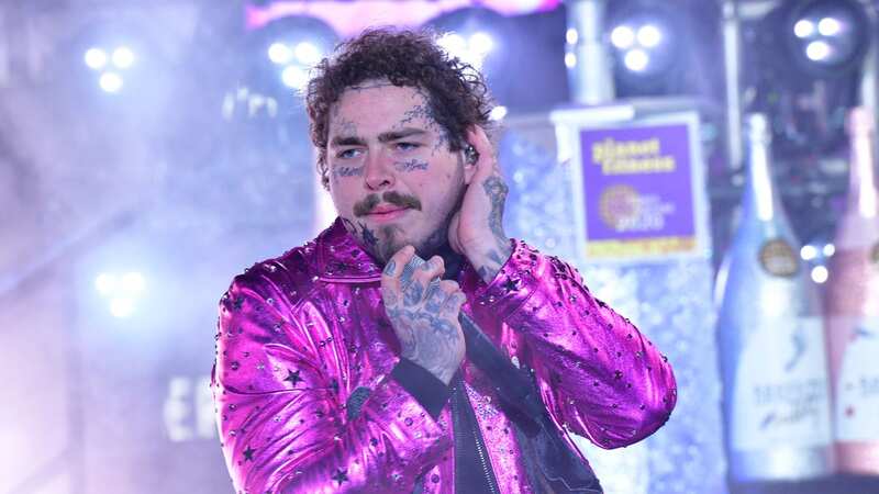 Post Malone performing on stage (Image: Getty Images for Dick Clark Prod)