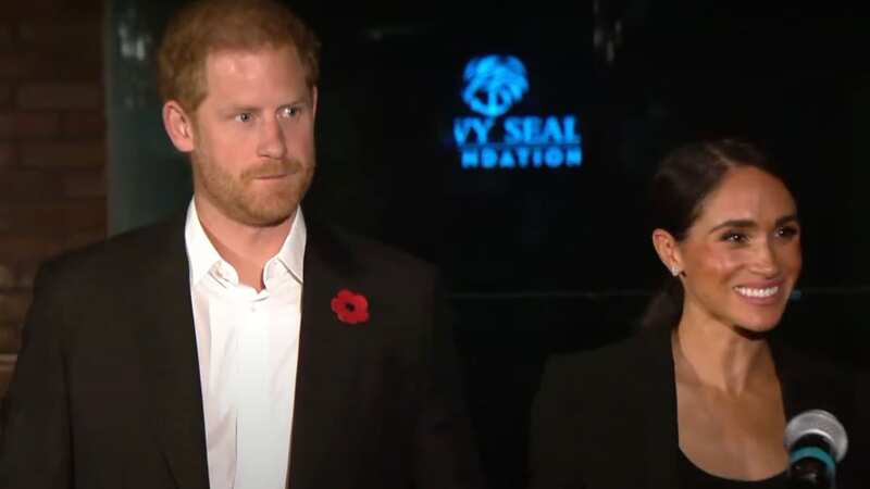 Prince Harry appears glum next to beaming Meghan Markle after birthday row