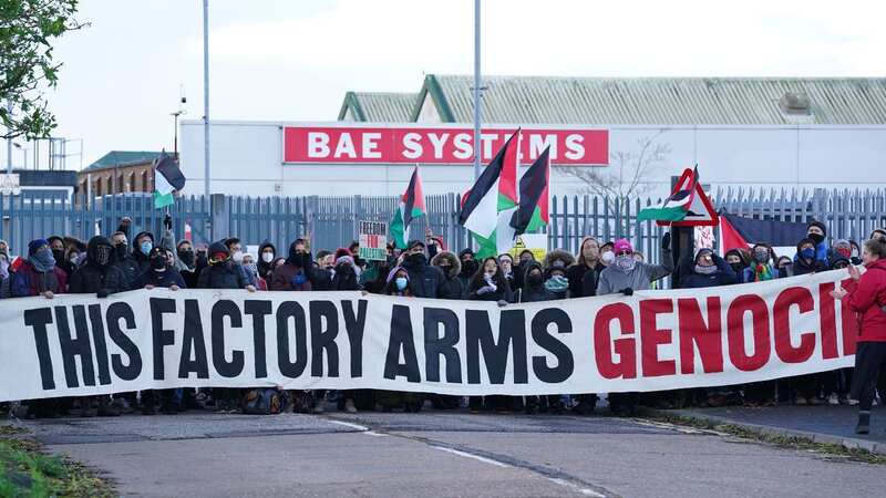 Trade unionists and protesters form a blockade outside BAE Systems in Rochester in Kent (Image: PA)