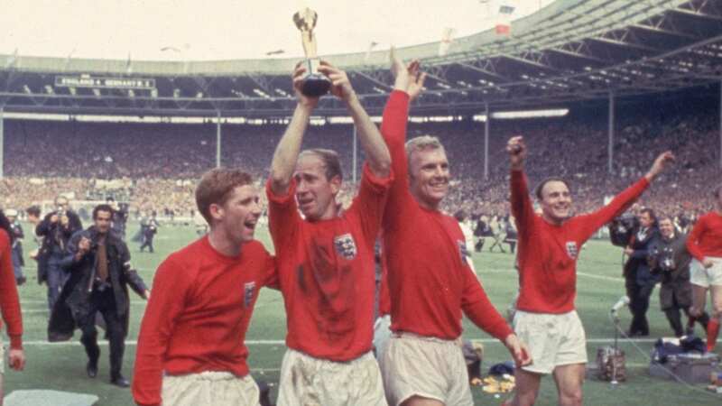 Sir Bobby Charlton lifts the World Cup aloft after winning it with England in 1966 (Image: Getty Images)