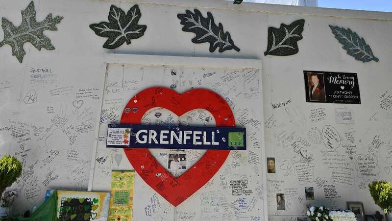 This image shows messages of support written on a wall surrounding Grenfell tower in west London (Image: AFP via Getty Images)