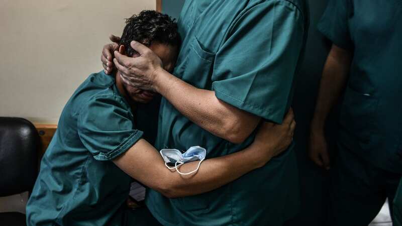 A Palestinian nurse, working at Nasser Hospital, mourns after he receives news his brother has been killed in the aftermath of Israeli attacks (Image: Anadolu via Getty Images)