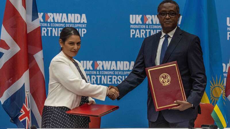 Former Home Secretary Priti Patel and Rwandan Minister of Foreign Affairs Vincent Biruta when the deal was announced in April 2022 (Image: AFP via Getty Images)