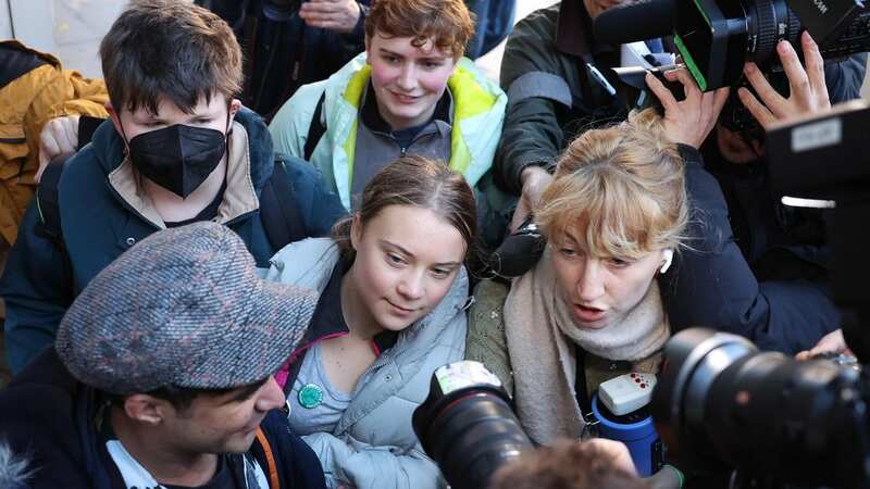 The climate campaigner was surrounded by Greenpeace and Fossil Free London protesters (Image: AFP via Getty Images)