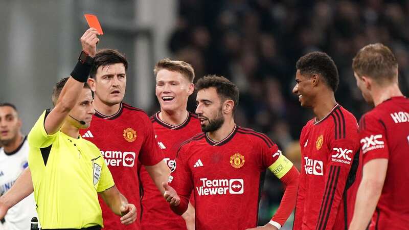Marcus Rashford is shown a red card (Image: PA)