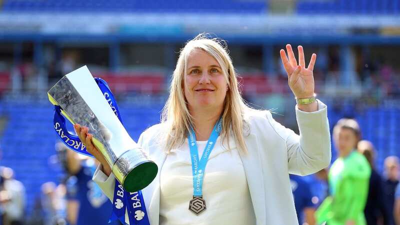 Emma Hayes with the trophy after securing Chelsea