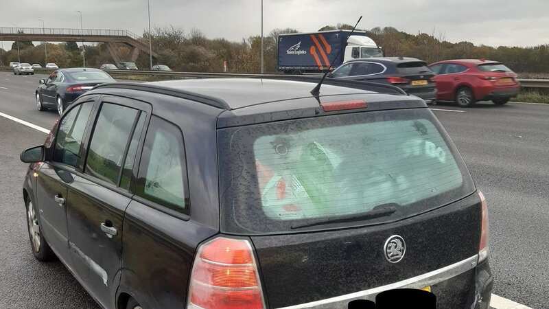 This Vauxhall Zafira had 15 people inside when it was stopped, police say (Image: North West Motorway Police /SWNS)