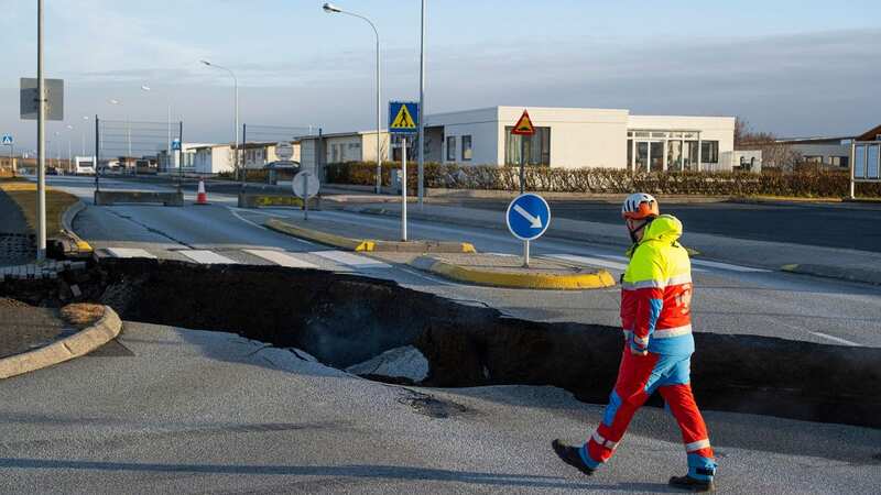 Crack cutting across the main road in Grindavik, southwestern Iceland following earthquakes. (Image: AFP via Getty Images)