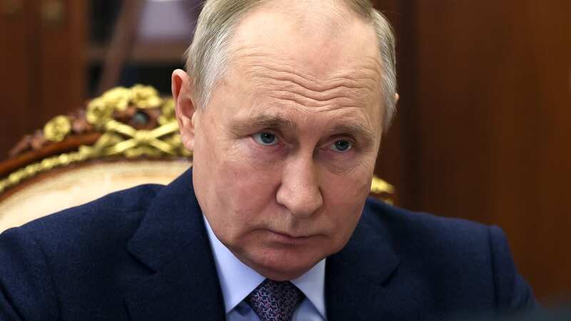 Russian President Vladimir Putin has signed a series of decrees to compel Ukrainians to get Russian passports (Image: AP)