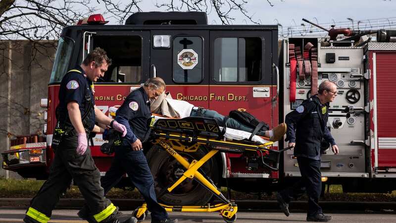 A person is taken away via ambulance after a Chicago Transit Authority train crashed into a piece of equipment that was on the rails