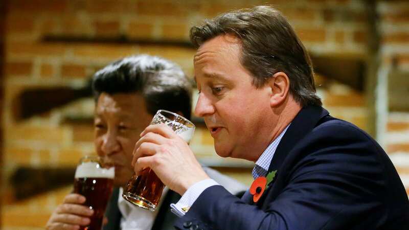 David Cameron enjoying a pint with Chinese President Xi in 2015 (Image: PA)