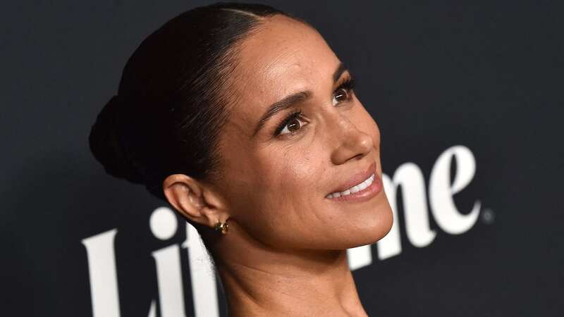 Meghan Markle looked glamorous at the event (Image: AFP via Getty Images)