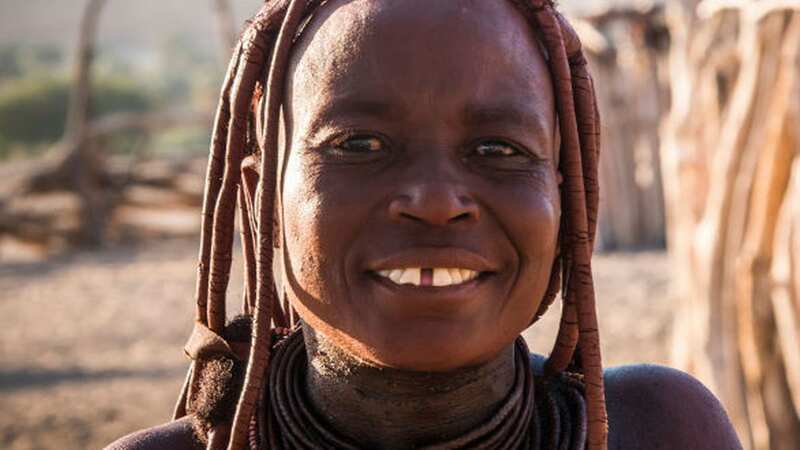It is deemed an age-old act of kindness for Himba wives to spend the night with male visitors (Image: Loop Images/Universal Images Group via Getty Images)