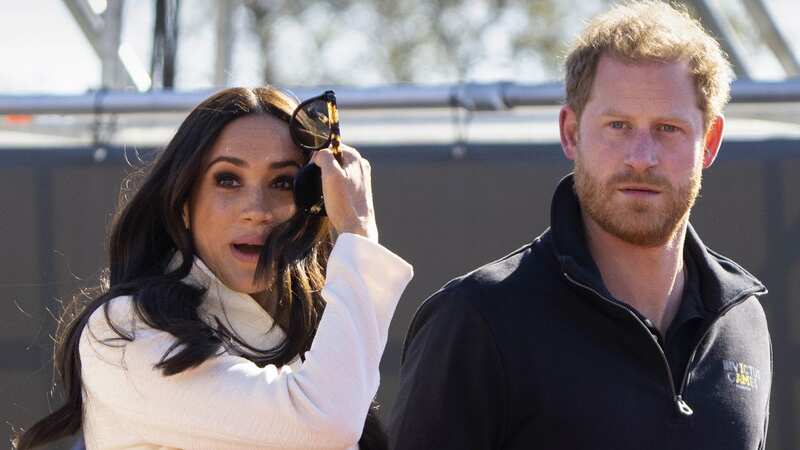Meghan Markle and Prince Harry are thought to be panicking (Image: Peter Dejong/AP/REX/Shutterstock)