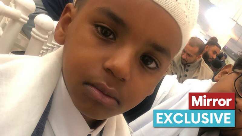 Mustafa Ahmed, eight, with his older brother Ahmed
