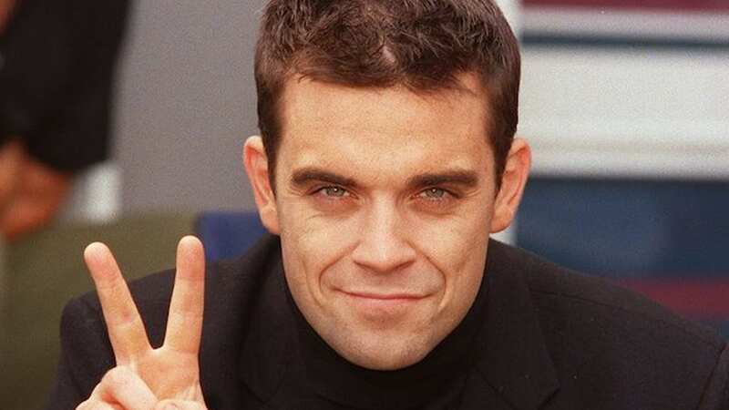 Robbie Williams had made the decision to leave Take That before he was kicked out by the boys in 1995 (Image: Mirrorpix)