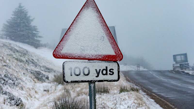 A snow-covered sign on the A939 Cock Bridge to Tomintoul Road in Scotland today