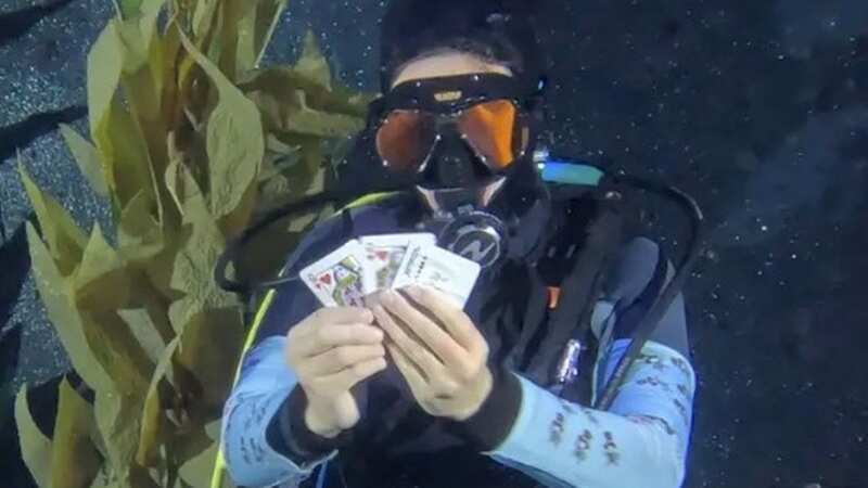 Girl, 13, completes record underwater scuba magic trick in impressive footage
