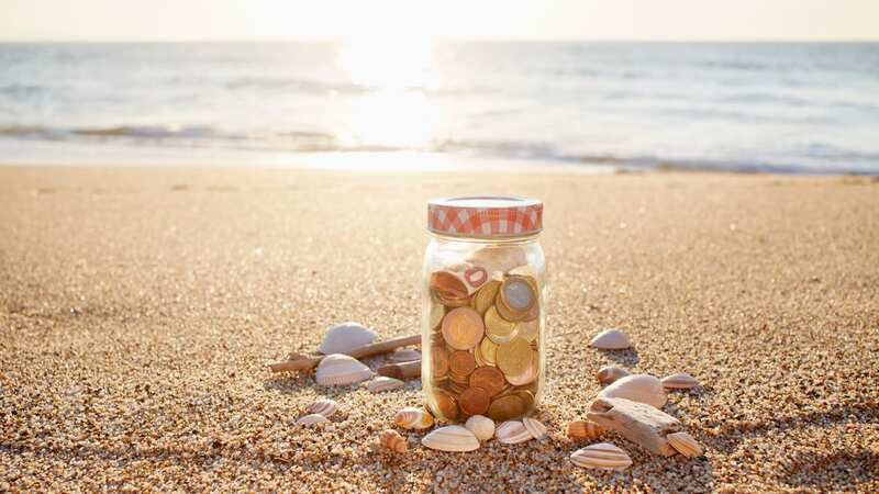 Spend less on your holiday extras (Image: Getty)