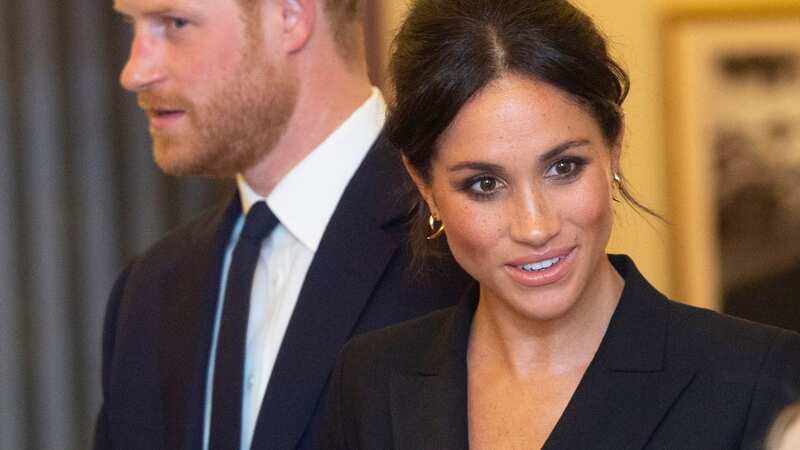 There were claims that Prince Harry had been spending time apart from wife Meghan Markle (Image: Getty Images)