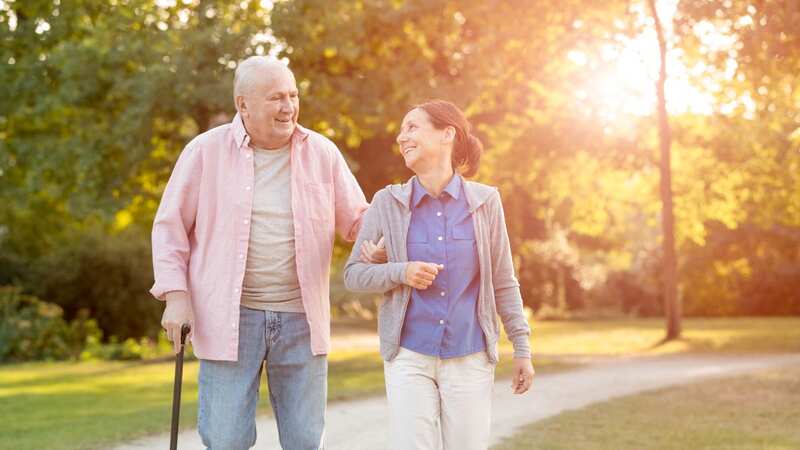 Walking has many health benefits (Image: Getty Images)