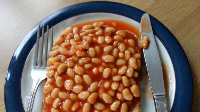 Over two million tins of baked beans are eaten in the UK every day (Image: Getty Images)