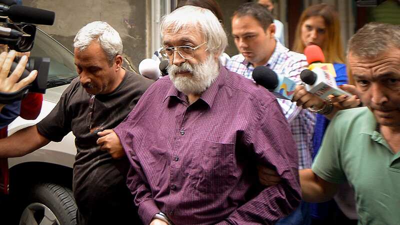 Romanian guru Gregorian Bivolaru pictured in 2016 after a hearing for his rape offence (Image: AP)