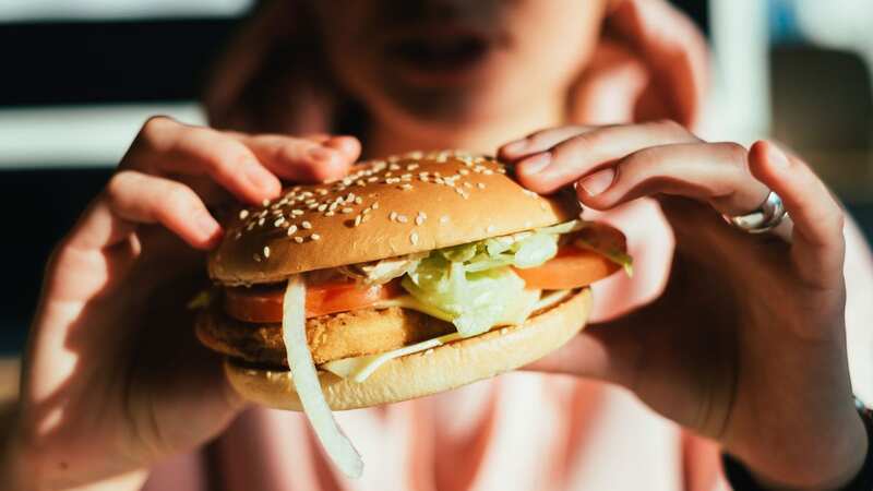 He opted for a big burger in between legs of his journey (Image: Getty Images/RooM RF)