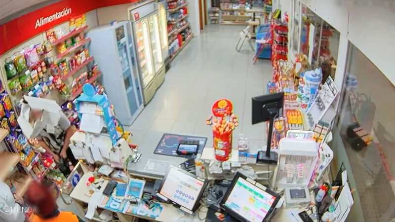 Bungling thief robs petrol station wearing cardboard box over his head