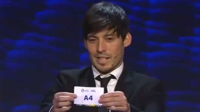David Silva struggled to contain his smile after sex noises were heard at the Euro 2024 draw (Image: BBC Sport)